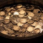 Eles invadiram a casa de um aposentado guarda florestal e confiscaram uma enorme quantia de dinheiro.